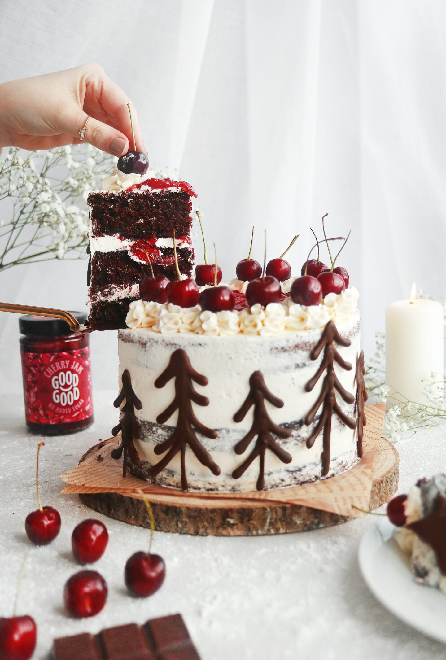 New Vegan Vanilla Black Forest cake with donuts and outlets chocolate chip cookies on the top 8” dairy free, egg free.